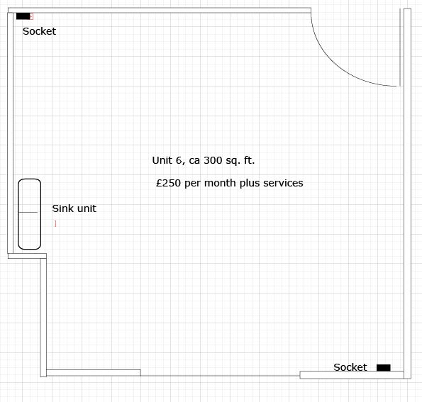 Floorplan of vacant Unit 6, showing position of door and window, sink unit, and two sockets